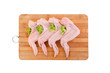 Raw chicken wings with green salad