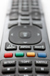 The remote control unit. Focus on color buttons