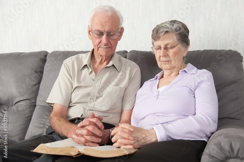 Photo: An Elderly Couple Having Worship With The Bible An Elderly Couple Having Worship With The Bible