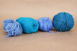 four blue clews on brown paper background