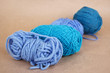 four blue clews on brown paper background