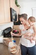A Mother Making A Sandwich For His Baby Girl