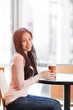 Woman drinking coffee