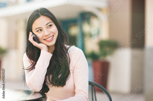 Photo: Asian woman on the phone Asian woman on the phone