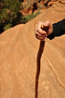Hiking Stick Hand and Sandstone