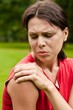 Shoulder injury - sportswoman in pain Shoulder injury - sportswoman in pain