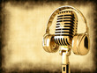 Photo en ligne au meilleur prix Microphone with headphones on old background