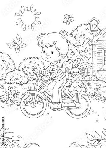  Girl rides a bicycle