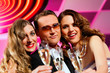 People with champagner in a bar