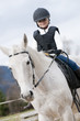 Horse riding - little girl is riding a horse
