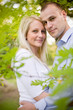 Photo: Attarctive young couple cuddling. Attarctive young couple cuddling.