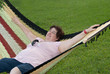 Lady rests over a hammock