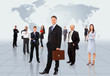 Businessmen standing in front of an earth map