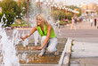 Girl about fountain