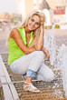 Girl about fountain