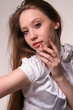 Pretty girl showing her manicure.