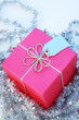 Pink Gift box with a silver ribbon and tag Pink Gift box with a silver ribbon and tag