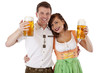 Bayerische Frau und Mann in Dirndl u. Lederhose mit Oktoberfest
