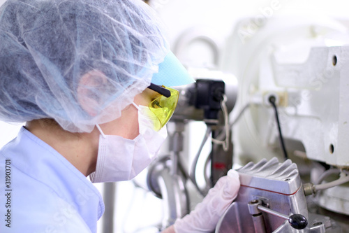 Photo: Female Worker At Pharmaceutical Factory Female Worker At Pharmaceutical Factory