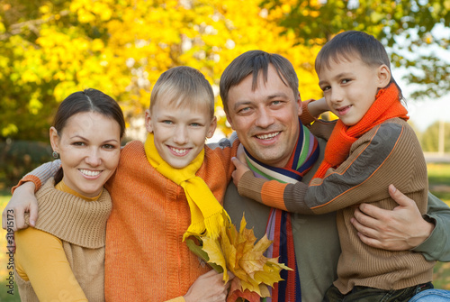 Photo: happy family of four happy family of four
