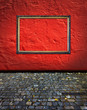 vintage red terracotta interior with empty classic frame hanging