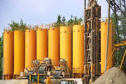 Photo: yellow silos in industrial site yellow silos in industrial site