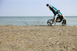 empty pushchair on beach empty pushchair on beach