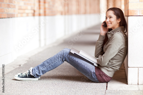 Photo: Ethnic student on the phone Ethnic student on the phone