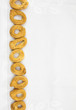 Kitchen Tablecloth Background with a row of Taralli, Copy Space Kitchen Tablecloth Background with a row of Taralli, Copy Space