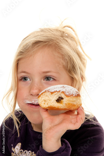 Photo: Kind im Fasching mit Krapfen. Kind im Fasching mit Krapfen.