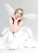 Young woman with angel wings