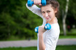 woman doing  exercise with dumbbell