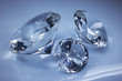 Shiny diamonds jewel on dark blue