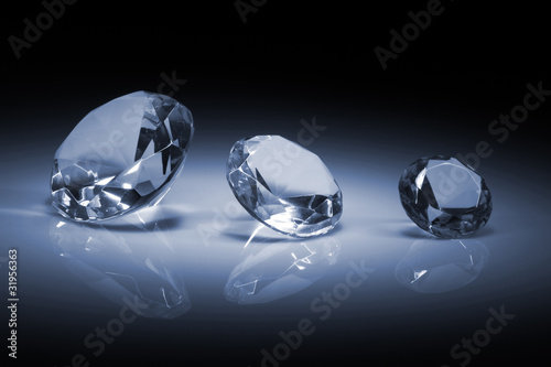 Photo: Shiny diamonds jewel on dark blue Shiny diamonds jewel on dark blue