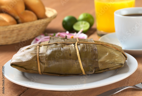 Photo: Peruvian food called Tamal (made out of cooked corn) Peruvian food called Tamal (made out of cooked corn)
