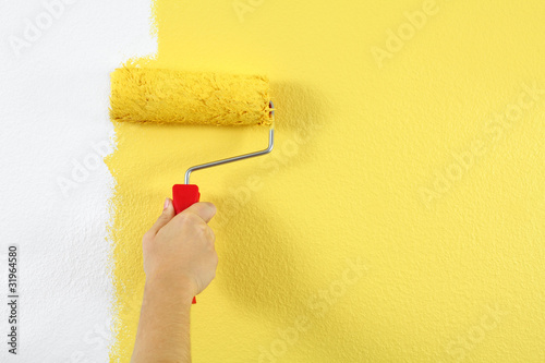 Foto: Painting a wall Painting a wall