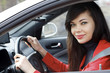 Pretty brunette driving a car Pretty brunette driving a car