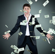 man in a suit throws money