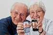 senior couple with smartphones