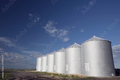 Photo: Row Of Metal Silos Row Of Metal Silos