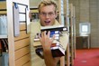 Young Man In A Library