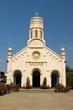 Pastel yellow church against blue sky Pastel yellow church against blue sky