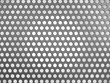 Carbon fibre surface with holes