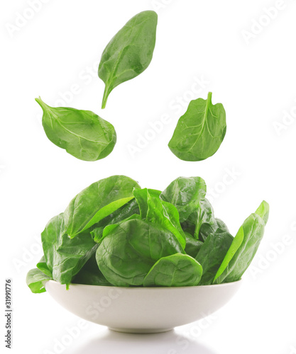 Photo: fresh spinach in a white bowl fresh spinach in a white bowl