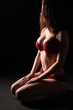 Foto: sitzende Frau in Dessous sitzende Frau in Dessous