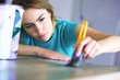 portrait of young woman with painting tools