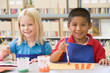 Kindergarten children painting