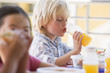 Kindergarten children eating lunch
