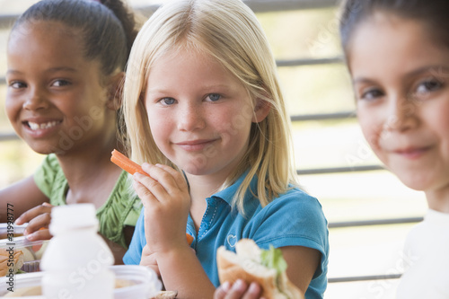 Photo: Kindergarten children eating lunch Kindergarten children eating lunch