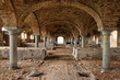 Old ruined abandoned stable with beautiful roof